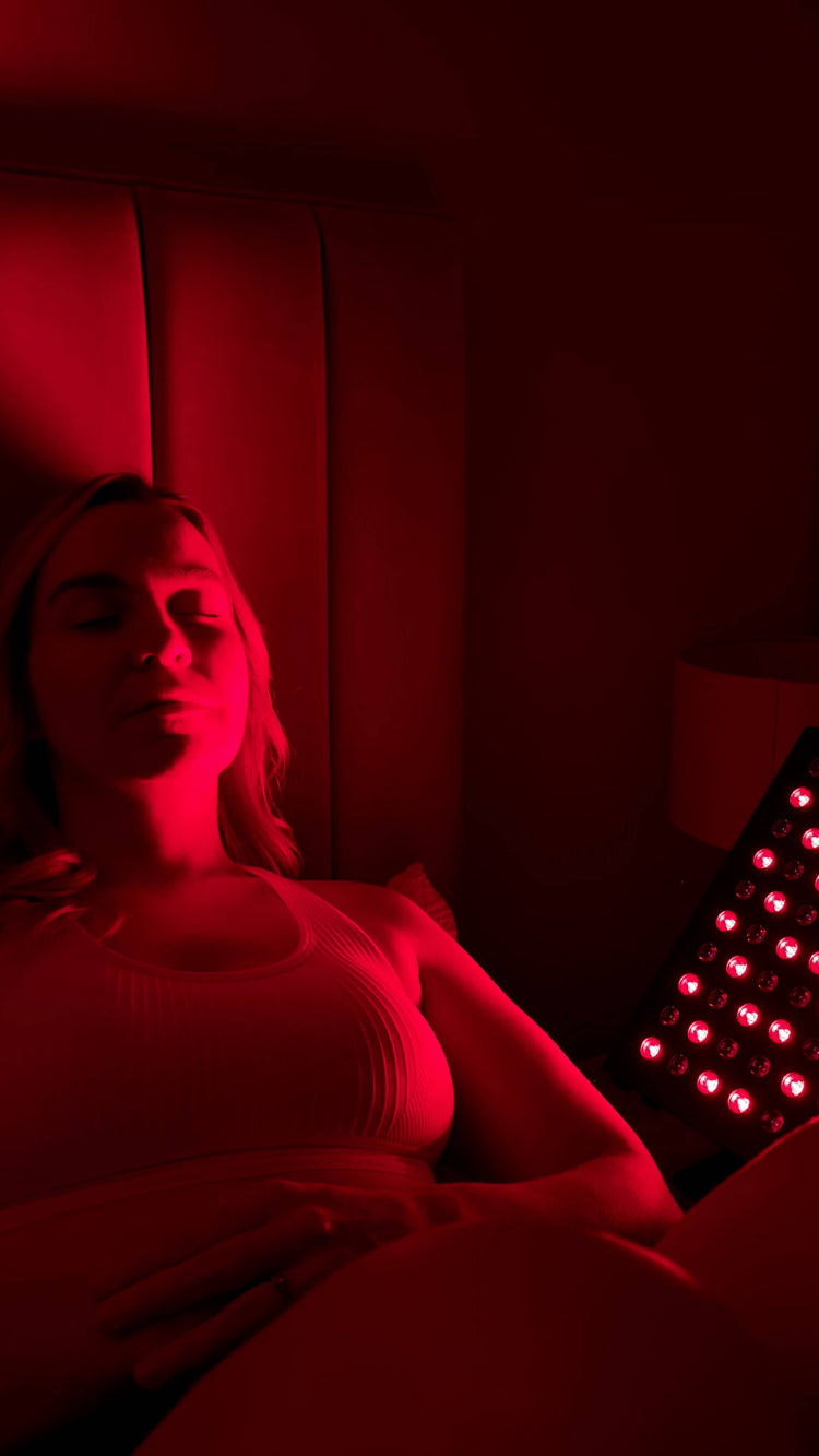 a girl relaxing in fron of LumiRed therapy device