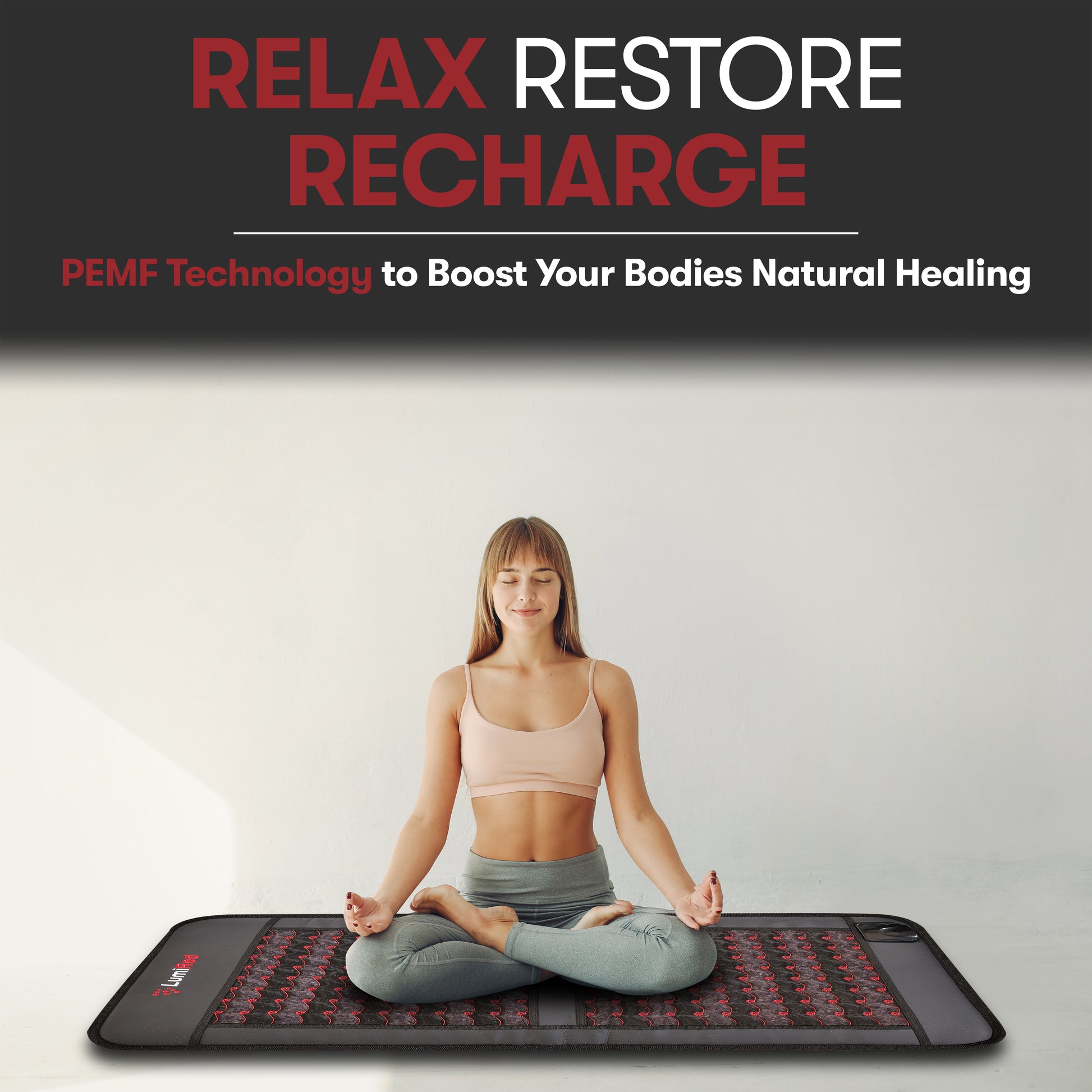 A woman doing yoga on red light mat